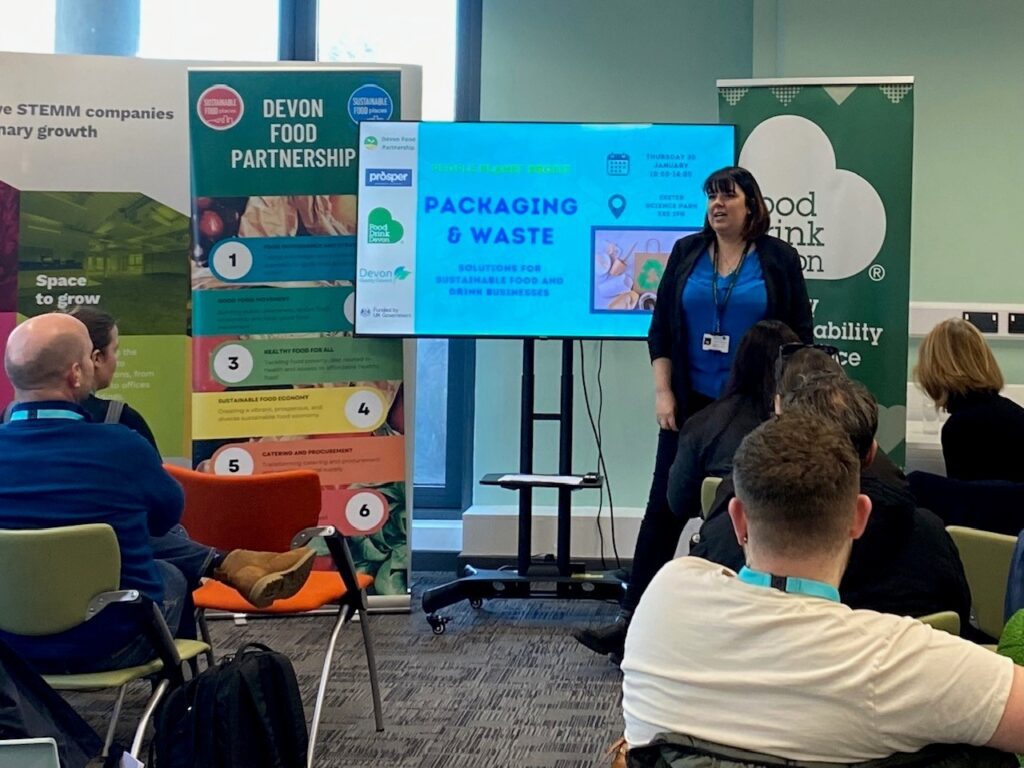 Speaker in front of audience at PPP Packaging and Waste