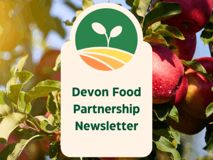 red apples growing on branch with Devon Food Partnership Newsletter text in front